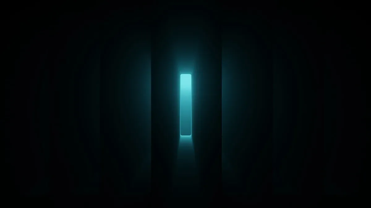 a dark room with a light at the end